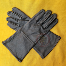 crossed black leather gloves