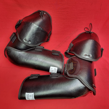 Black arm protection on red background